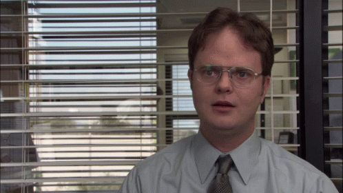 É um GIF do personagem Dwight Schrute, interpretado por Rainn Wilson, na série de televisão americana 